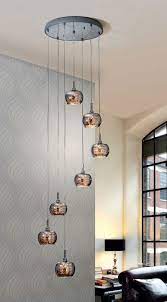 Does anyone have a good solution for hiding the ugly wires but still allowing enough light. Long Drop Led Pendant Smoked Glass Shades Drop Ceiling Lighting High Ceiling Lighting High Ceiling Lighting Fixtures