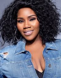 Which song is better, 'Through the Fire' by Chaka Khan or 'Living All  Alone' by Phyllis Hyman?