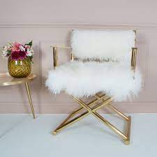 Our mongolian sheepskin benches are made with the highest quality luxury sheepskin and leather wrapped upholstery on a wooden frame with our crystal clear lucite acrylic furniture legs. Mongolian Fur Gold Armchair Directors Chair Audenza