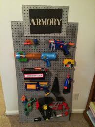 I thought about a pegboard system like this one, . Nerf Gun Display Rack Online Discount Shop For Electronics Apparel Toys Books Games Computers Shoes Jewelry Watches Baby Products Sports Outdoors Office Products Bed Bath Furniture Tools Hardware Automotive