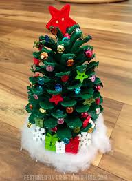 And if you have pine cones nearby to collect for jute twine, scissors, and pine cones—lots and lots of pine cones. Decorate Pinecone Christmas Trees Crafty Morning
