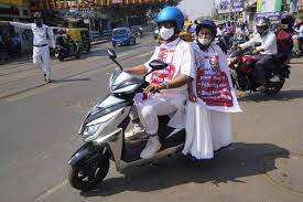 Pm modi's jibe as cm protests fuel price hike. Mamata Rides Pillion On Electric Scooter To Protest Fuel Price Hike Eastmojo