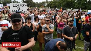 Black lives matter protest organiser paddy gibson is detained by police in the domain on july 28, 2020 in sydney, australia. Covid Anti Vaccination Protests Held In Australia Ahead Of Rollout Bbc News