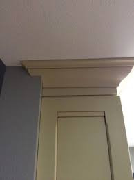 Even if the upper cabinets do not extend to the ceiling, crown molding is necessary. Cabinet Too Close To Corner To Conceal Crown Moulding