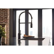 Now available on select kitchen fixtures, moen's black stainless finish has been designed to stand out on its own or blend with existing elements to infuse the kitchen with understated elegance. Moen 5923bls Black Stainless Steel Align 1 5 Gpm Single Hole Pull Down Kitchen Faucet With Spot Resist Finish And Duralast Faucetdirect Com