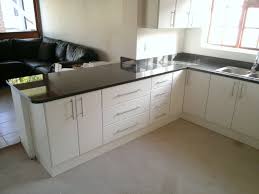 Created By Dimension Cabinets White Melamine Kitchen With Cupboard Storage And Rustenburg Granite Tops Laminate Kitchen Built In Cupboards Cupboard