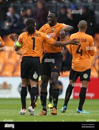 Barnet's Anthony Acheampong (right) celebrates scoring with Edgar Davids  (left Stock Photo
