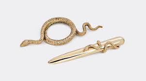 How To Style Your Space With Snake Themed Home Decor Gold Magnifying Glass Fine Jewels Everyday Essentials Products