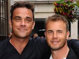 Robbie Williams and Gary Barlow's vicious feud that led to secret serious  illness