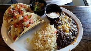 Maybe you would like to learn more about one of these? Foto De Mad Moe S Osprey Mahi Fish Tacos With Black Beans And Rice Side Guacamole And Sour Cream Very Good Tripadvisor