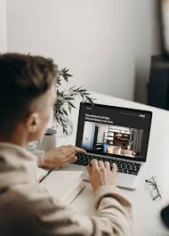 Download Free Laptop Mockup In Workspace Scene