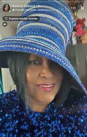 Dress by Andrae Terrell Hat by EXPRESSIONS
