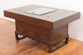 Made of light elm wood with a glass top and copper insert. Pin On Tables