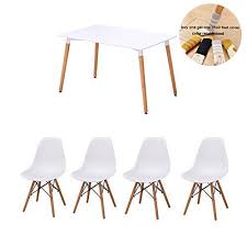 Rectangle wood kitchen table and chairs. Stream Dining Table And Chair Set 4 Eiffel Retro Style Rectangular Table Chair With Wood Leg For Dining Room Modern Kitchen Furniture White Rectangular Table 4 Chair Buy Online In Bahamas At Bahamas Desertcart Com