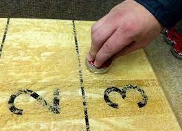 Before you powder the table, apply a light coat of silicone spray. Shuffleboard Tips The Basics Of Shooting Shuffleboard Pucks