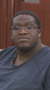 Suspect accused of deadly shooting at rental car shop returns to court