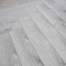 Tile laminate flooring has become the most popular type of flooring due to tremendous advantages. Grey Laminate Flooring 12mm Vinatge Herringbone