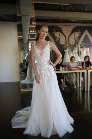 Our Newest Gown From New York Designer Reem Acra Waterfall This Beaded Lace A Line Gown Just Floats Across Reem Acra Wedding Dress Bridal Gowns Luxury Bridal