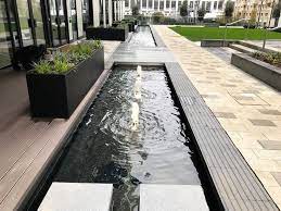 Rill Water Features And Bubbling Water Jets Set In A Landscaped Courtyard At Wembley Park Nw06 Water Features Private Garden Wembley