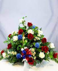 Red, white, and blue flowers are perfect for an independence arrangement and 4th of july flowers. Red White Blue Sympathy Fireside Basket Avas Flowers