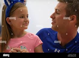 U.S. Air Force Captain Hunter Heinselman (left) and Lt. Col. Scott Motley  (right), pilots for the 15th Airlift Squadron, peer out the clearview  windows of a C-17 Globemaster III from Joint Base
