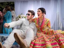 Nick jonas, 26, and priyanka chopra's, 36, first official wedding photos have been unveiled, showing the happy couple priyanka chopra stuns in a red lehenga and white ralph lauren gown decorated with two million pearl sequins and a 75ft veil as she and nick jonas unveil first official shots. We Still Liked Each Other Priyanka Chopra On Spending Quarantine With Nick Jonas Filmfare Com