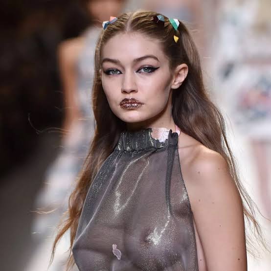 Gigi Hadid flashes nipples in completely sheer dress as she steals catwalk crown at Fendi show - The Mirror