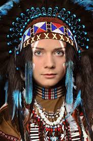 Native Indian Face In Hole. Native Costume And War Bonnet