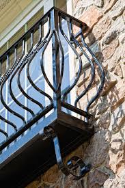 This design incorporates a balcony handrail which connects with the stair railing and leads into the balcony handrail design, just like most parts of a home or new construction, are governed by. Balcony Railings Compass Iron Works