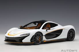 The mclaren f1, released back in the nineties, was designed to be the most technically capable by that yardstick, the mclaren p1 had a lot to live up to as the f1's spiritual predecessor at the top of the. Mclaren P1 Alaskan Diamond White With Orange Accents Autoart