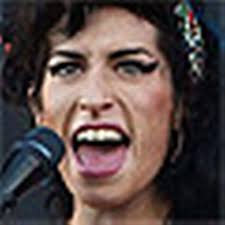 Amy Winehouse was five times the drink-drive limit when found dead in bed  in London flat, inquest hears