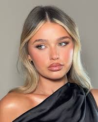 Soft bronzed skin and textured hair