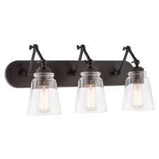 Wac lighting offers architectural products, decorative lighting, and landscape lighting focuses on addressing known problems or meeting unfulfilled needs with lighting solutions in commercial, residential, and hospitality settings. Kira Home Elliot 24 3 Light Vintage Industrial Swing Arm Vanity Bathroom Light Clear Glass Shades Oil Rubbed Bronze Walmart Com Walmart Com