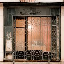 Security Gates Can Be Beautiful Gray And Rose Lingergie Gate Window Retail Cafe Design Coffee Shop Design Retail Interior