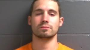 Man jumps from moving car, father and son arrested