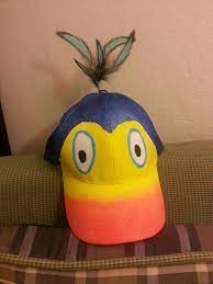 Kevin From Up Painted Hat Using Metallic Blue Light Blue Black Yellow And Orange Fabric Paints On A White H Mickey Halloween Halloween Fun Family Halloween