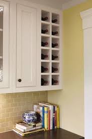 Rather than simply storing your bottles on the bottom shelf of your bar cart, you can incorporate them into your room's decor with the help of some seriously stylish wine storage. My Balsam Hill Home Stylish Ways To Store Wine Balsam Hill Artificial Christmas Trees Blog Built In Wine Rack Wine Rack Design Kitchen Wine Rack