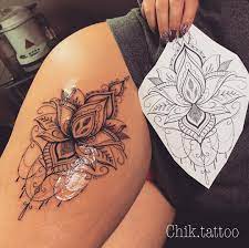 The intricate design of the stem and leaves coupled with a beautiful bird standing on it exude elegance. Pic 1 Ou 2 Hip Thigh Tattoos Cute Thigh Tattoos Thigh Tattoo Designs