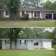 Blue green gray exterior paint. Brick Ranch Exterior Makeover Painted Brick Hgtv Sherwin Williams Hammered Zinc Gray Ranch House Exterior Brick Ranch Exterior Makeover Painted Brick House