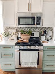 Painting old kitchen cabinets diy. How To Diy Painted Kitchen Cabinet Tutorial The Beauty Revival