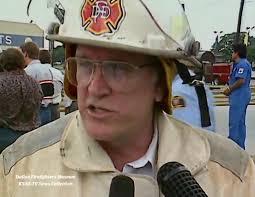 Firefighter rescues woman from burning building