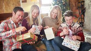 Family opening gifts on Christmas - Stock Photo - Dissolve さん