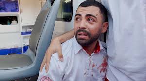 Palestinian paramedic engulfed by grief after realizing mother among dead  following Israeli airstrike