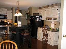 Pin By Brooke Backes Leonard On Kitchen Black Appliances Kitchen Antique White Kitchen Cabinets Off White Cabinets