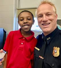 KINDNESS: Today (3/15/24) several PPD Officers and Command Staff personnel  paid a visit to Rolling Acres Middle School. The students are participating  in a letter-writing campaign for First Responders thanking them for