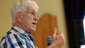 Renowned author says community should flex its muscle to prevent tire  burning