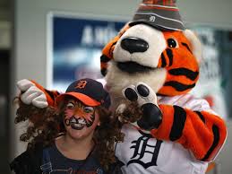 Detroit Tigers Mascot Paws Messes With A Young Fan After She Had Her Face Painted During The Tigers Annual Tigerfest Event At Co Detroit Tigers Mascot Detroit