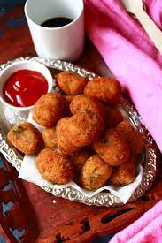 Potato Nuggets Recipe A Tasty Snack With Potatoes Potato Nuggets Are A Vegetarian Version Of The Popular Chicke Veg Snacks Vegetarian Snacks Nuggets Recipe