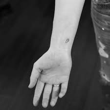 Minimalist Rocket Tattoo On The Inner Wrist Rocket Tattoo Elbow Tattoos Small Music Tattoos