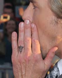 Dax shepard tattoo, cherry blossom tattoo. Celebrity Tattoos Ok Magazine